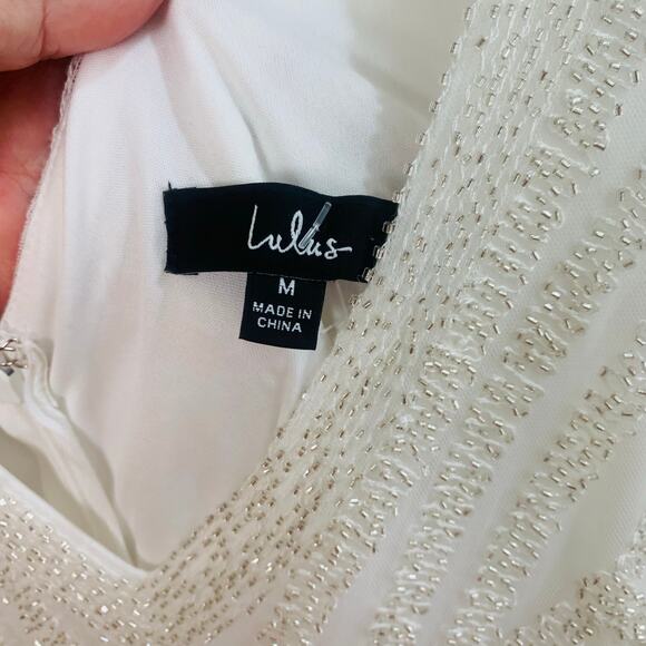 Lulu's White V-Neck Jumpsuit - Picture 13 of 13